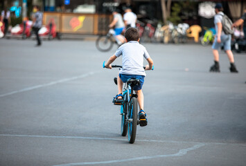 Fototapeta premium boy ride the bicycle