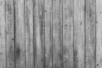Rustic wood texture or background with scratched paint.  Monochrome.