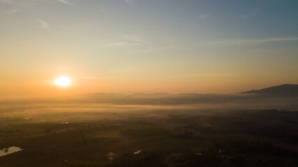 Aerial view of beautiful mountain with mist at morning in north Thailand