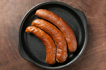smoked sausage on a wooden board