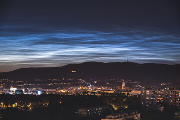 NLC clouds over the city