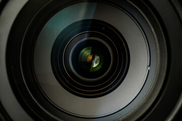 Macro shot of the camera lens. light beautifully reflecting and refracting in the glass