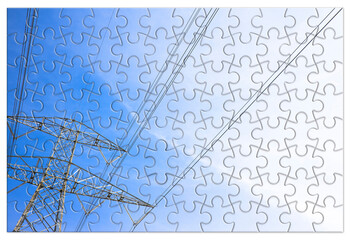 Power tower and transmission lines - concept image in jigsaw puzzle shape