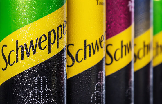 Moscow, Russia-July 9, 2020: Schweppes carbonated drinks in aluminum cans with different flavors. Schweppes is a brand of soft drinks founded by Jacob Schwepp in 1783