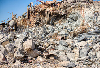 Fragments of the destroyed building. Fragments of concrete walls and foundations.