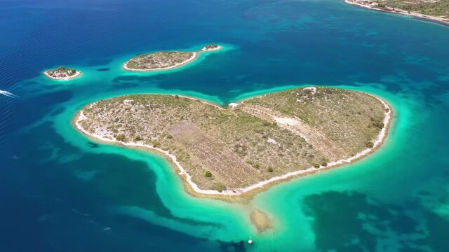 Heart shaped island of Galesnjak near Zadar in Dalmatia on Croatian Adriatic sea, aerial footage from drone
