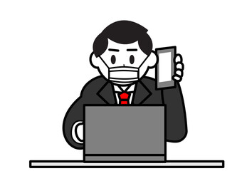 マスクをして仕事をするビジネスマン