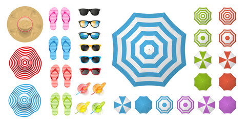 Beach elements and objects. (top view) Hats, flip-flops, sunglasses, cocktails, sun umbrellas. (view from above).