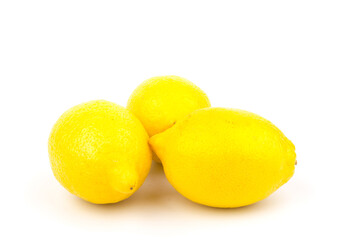 Group of lemons in close up, isolated on white background