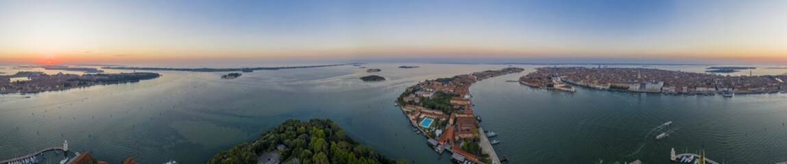Fototapeta na wymiar Aerial panorama of the lagoon of Venice and Lido island during sunrise