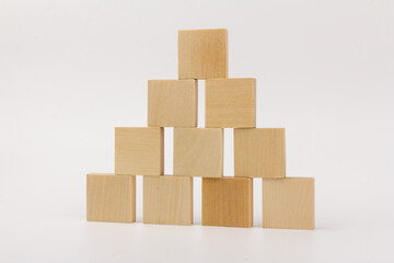 Wooden blocks to build a wall. Concept of new business, partnership, integration and startup