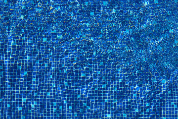 Abstract pool water surface, vibrant blue colors. Perfect backdrop