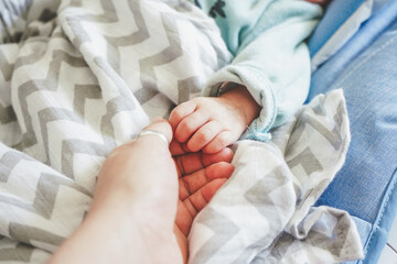 Little hand of a newborn baby