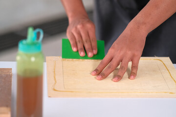 Process of gluing plank of plywood