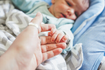 Little hand of a newborn baby