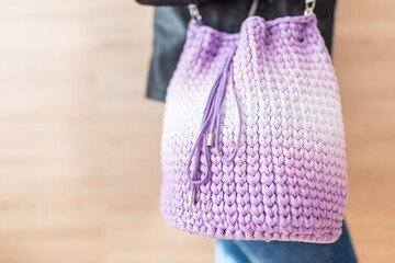 Gradient Handbag made of polyester purple and white yarn. Handmade crochet purse. Product photo....
