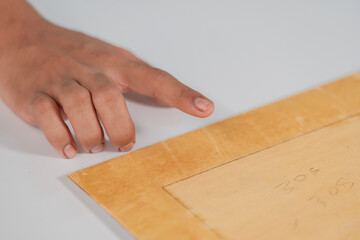 Fototapeta na wymiar Process of gluing plank of plywood