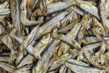 Dried salted sardelle or tulka fish texture.