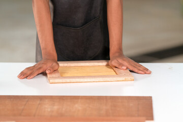 Process of gluing plank of plywood
