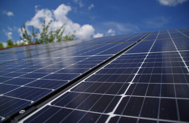 Solar photovoltaic panels with clouds reflection