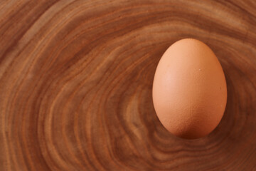 chicken eggs on a wooden background. Concept photo. Close-up.
