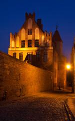 Fototapeta na wymiar Gothic St. George guildhall at Podmurna street in Torun. Poland