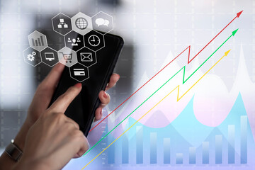 Business hands of using smartphone with Digital marketing media and virtual globe shape diagram. Business Financial icons graphs. Work from home.