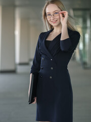 Young businesswoman with laptop. Selective focus.