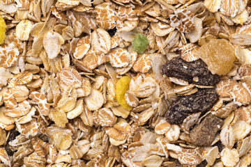 oatmeal with raisins, coconut, pineapple and banana slices isolated on a white background. For packing oatmeal or granola.