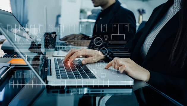 Business teamwork or business partners discussing documents and meeting at the modern office desk. Global Strategy Virtual Icon. Innovation Graphs Interfaces. Workplace strategy concept.