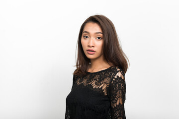Fototapeta na wymiar Studio shot of young beautiful Asian woman