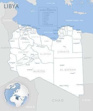 Blue-gray detailed map of Libya administrative divisions and location on the globe.
