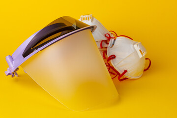 Face shield and medical face masks. Protection against coronavirus concept