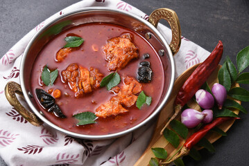 Fish curry, Chettinad Meen Kuzhambu, is a hot and spicy seafood of Chennai, Tamil Nadu in India....
