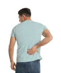 Man suffering from lower back pain on white background. Visiting orthopedist