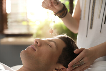 Man during healing session in therapy room