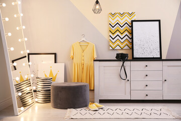 White chest of drawers in stylish dressing room. Interior design