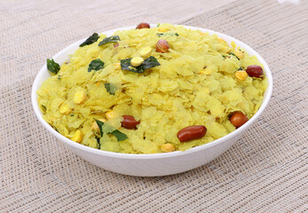 Indian Traditional Spicy And Sweet Mixture Namkeen Also Know as Chivda, Farsan, Namkin, Chiwada, or nylon chevdo on wooden background