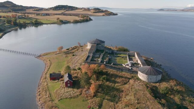 Aerial view of the Steinvikholm Castle - an island fortress on the Skatval peninsula near Stj&oslash;rdal in Tr&oslash;ndelag county, Norway. The narrow brigde connects the island to mainland.