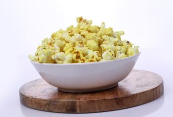 Popcorn in a bowl. Snack for a movie