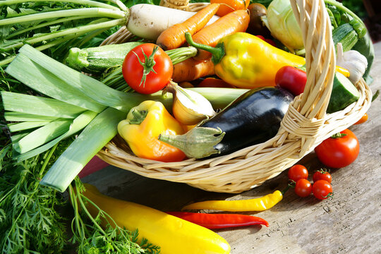 Colorful healthy vegetables in basket, copy space
