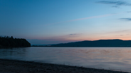 Sunrise on the lake in summer season