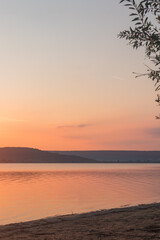 Sunrise on the lake in summer season