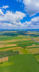 Panoramic Aerial vast green field view - Agriculture field aerial photo - Green landscapes drone photo