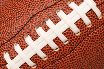 Close-up or marco shoelace of American leather football, full frame, rugby ball.
