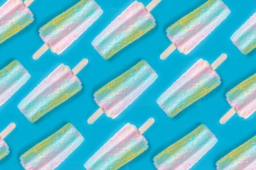  Bright colorful ice cream pattern. Sweet ice-cream lollypops layout on trendy sea blue background. Summer pattern backdrop concept © ricka_kinamoto