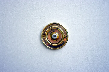 door bell push on textured white paint