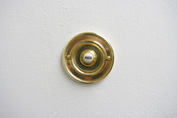 door bell push on textured white paint