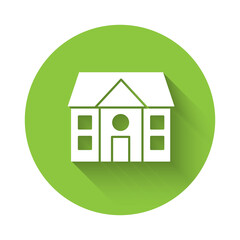White House icon isolated with long shadow. Home symbol. Green circle button. Vector Illustration.