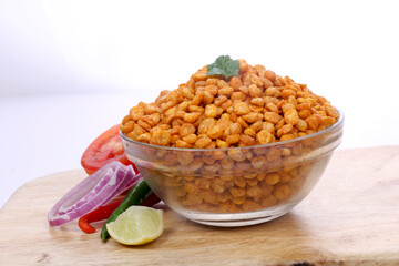 Fried Salted Chana Dal, Snacks for every occasion, Glass bowl on white background, Chana Dal Masala is a popular Chakna recipe